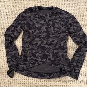 Lululemon camo lined long sleeve top. Size 8 but cut small.